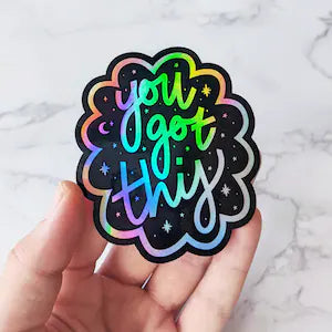 A motivational sticker that reads "You Got This" in bold, encouraging letters, perfect for boosting confidence and positivity.